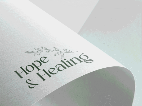 Hope and Healing's Logo Design Mockup on paper